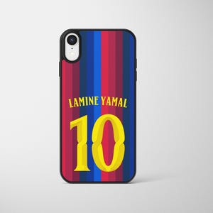 May include: A black phone case featuring a vertical striped pattern in red, blue, and dark purple. The text LAMINE YAMAL is printed in yellow above the large yellow number 10. The case has a circular cutout for a camera lens in the top left corner.