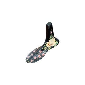 Vintage black cast iron cobblers shoe last with vintage painted pink green floral motif, cast iron door stop, metal bookend