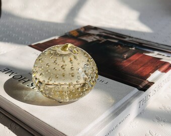 Vintage clear glass controlled bubble paperweight, fuller apple shape, 420g
