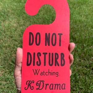 Door knob, wood door knob, Do not Disturb watching K drama sign. Watching k dramas sign, Do not disturb sign. Door sign Do not disturb