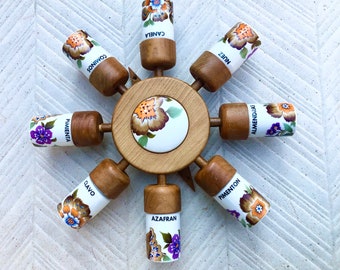 Lazy susan mid century wall mounted spice wheel. Wood and ceramic 60s- 70s  revolving spice rack.  Wooden sunburst, made in Spain by Guillen