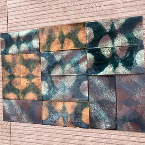 Spanish vintage FAT LAVA tiles from the 70s. 12 UNUSED brutalist style tiles in green + orange. Mid century flower power, groovy wall decor