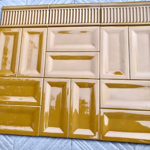 Art nouveau style border tile set from Spain. 15 yellow glazed vintage style new tiles. Majolica tile mural. Fireplace /backsplash/border