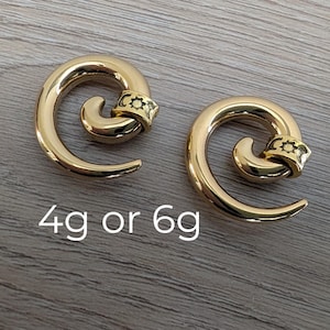 May include: A rustic wooden sign with the text "Welcome to our home" in white lettering. The sign features a distressed finish and a simple, inviting design, perfect for front door decor.