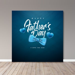 May include: Happy Father's Day greeting card with a blue bow tie and two blue hearts on a dark blue background. The text reads "Happy Father's Day" and "I love you Dad".