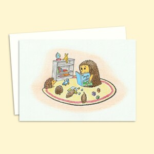 Cute Hedgehogs Greeting Card with a Hand-Drawn Illustration of Young Hoglets Enjoying Story Time, Blank Inside for your Own Message