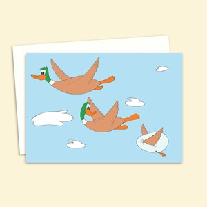 Carte de voeux Flying Ducks avec une illustration dessinée à la main, adaptée à toutes les occasions, vierge à l'intérieur pour votre propre message