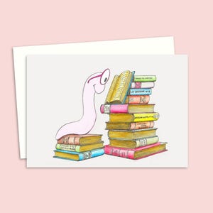 Cartão de felicitações para leitores ávidos com uma ilustração fofa e engraçada desenhada à mão para amantes de livros, com interior em branco para sua própria mensagem