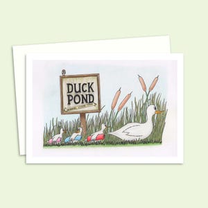 Carte de voeux mignons canards - Illustration dessinée à la main d'une famille de canards sur le chemin de l'étang - Intérieur vierge pour votre propre message