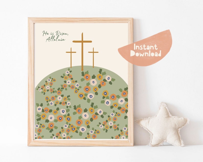 K&ouml;nnte beinhalten: Ein druckbarer Kunstdruck mit einem gr&uuml;nen H&uuml;gel, drei braunen Kreuzen und dem Text "He is Risen, Alleluia". Der H&uuml;gel ist mit kleinen orangefarbenen, gelben und wei&szlig;en Blumen bedeckt.