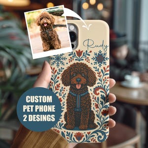 May include: A custom phone case with a brown dog illustration and floral design. The case has the name "Rudy" in script. A small photo of the dog is in the upper left corner. Text on the case reads "CUSTOM PET PHONE 2 DESIGNS". The case is held in a hand.