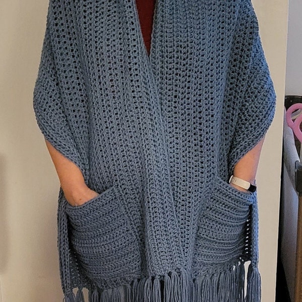 a shawl with pockets