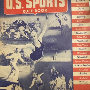 May include: A vintage book cover for "U.S. Sports Rule Book" featuring a collage of various sports illustrations, including basketball, football, swimming, and golf. The cover is red, white, and blue with a price of 50 cents.