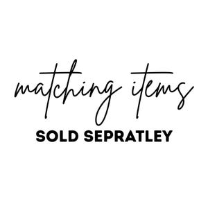 May include: White background with the words "matching items" in a cursive font above the words "SOLD SEPRATLEY" in a bold, sans-serif font. The text is black.