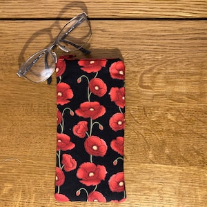Poppy padded reading glasses case or sunglasses zip pouch. Padded phone case. Mobile pouch. Handmade spectacles case in black cotton fabric.