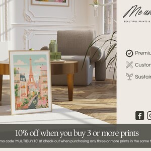 The image is an advertisement for a company called "Me and Kate" that offers beautiful prints and walls. It features a framed picture of a cityscape, a sofa, and a coffee table in a living room setting. The company emphasizes the premium quality, customizability, and sustainability of their products. They also offer a 10% discount on purchases of 3 or more prints, and encourage customers to enter a promotion code "MULTIBuy10" at the checkout to receive the discount.