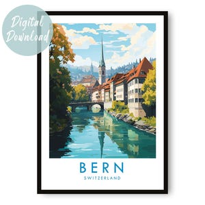 May include: A framed art print featuring a scenic view of Bern, Switzerland. The artwork depicts a river with reflections of buildings and a tall church spire. The print has a black frame and includes the text "BERN SWITZERLAND". A digital download sticker is in the upper left corner.