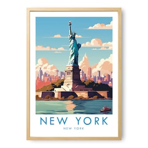 May include: A framed art print featuring a stylised illustration of the Statue of Liberty standing on a pedestal in the water with a city skyline in the background. The text NEW YORK is printed in blue capital letters at the bottom of the print.