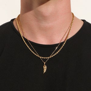 Necklace with store wing pendant