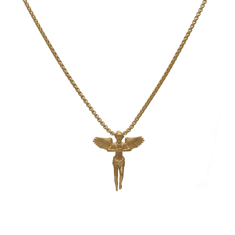 May include: A gold chain necklace with an angel pendant. The angel is depicted with wings outstretched and a serene expression.