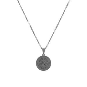 May include: A black chain necklace with a compass pendant. The compass is round and has a black finish. The compass has the letters N, S, E, and W around the edge.