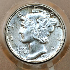 May include: Silver Mercury dime coin with the year 1941 and the words "In God We Trust" on the front.
