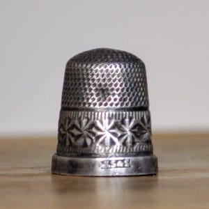 Antique Sterling Silver JS & S Tiny Thimble - Size 1, Imperfect Shape - Hand Stamped Flower Design - Small James Swann and Sons 925 Thimble