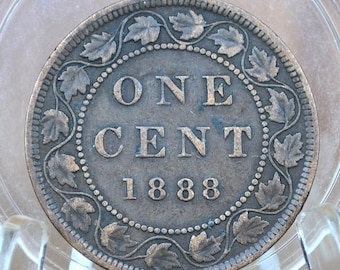 May include: A copper-colored Canadian one-cent coin with a wreath of maple leaves around the edge. The coin reads "ONE CENT 1888".