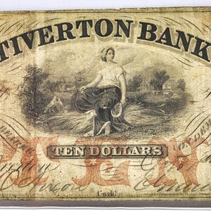 Billet de 10 dollars de la banque Tiverton (Rhode Island), rare et obsolète, datant de 1856. Il s'agit d'une coupure rare de grande valeur.
