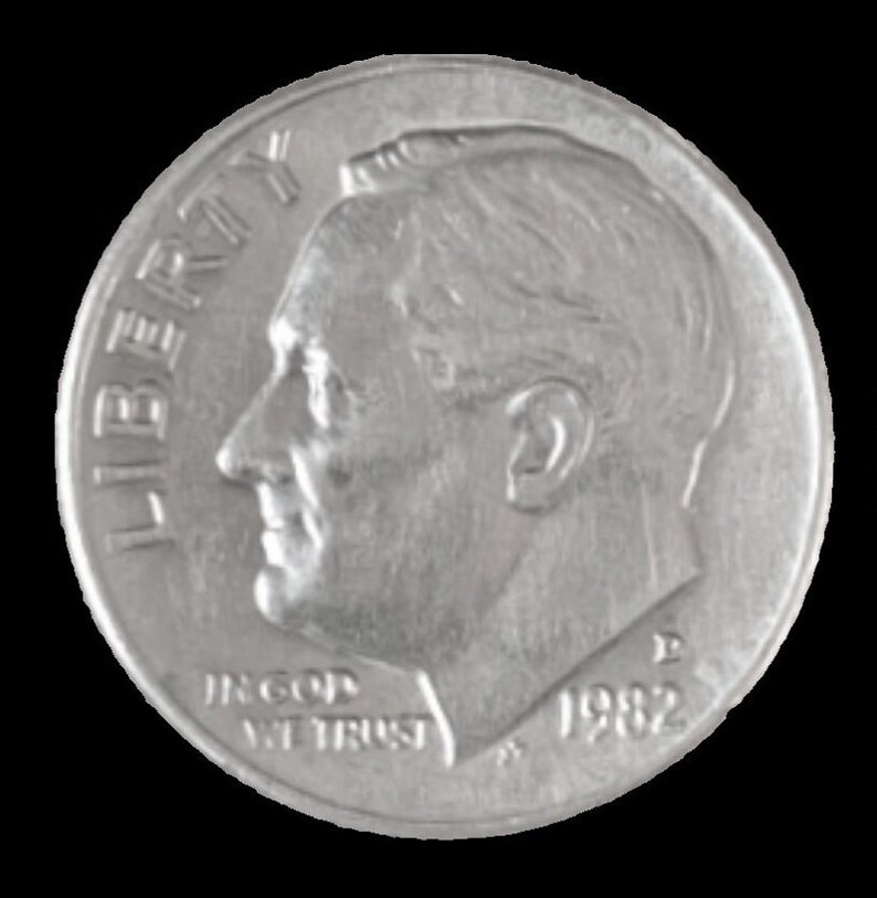 May include: A silver US dime coin with the words "Liberty" and "In God We Trust" and the year "1982" inscribed on it. The coin features a profile of President Franklin D. Roosevelt.