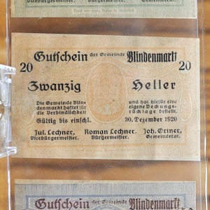 May include: Three vintage paper vouchers from the municipality of Blindenmarkt, Austria, dated 30 December 1920. The vouchers are for 10, 20, and 50 Heller, with the text "Gutschein der Gemeinde Blindenmarkt" printed at the top of each voucher.
