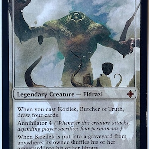 Könnte beinhalten: Eine Magic: The Gathering Sammelkarte mit dem Titel Kozilek, Butcher of Truth. Die Karte zeigt eine große, vielgliedrige, dunkle Kreatur vor einem bewölkten Himmel. Sie enthält den Text Legendary Creature - Eldrazi, eine 12/12 Stärke/Widerstandskraft und Spielregeln.