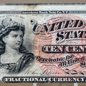 May include: An antique United States ten-cent fractional currency note. The note features a portrait of a woman on the left and the text "United States Ten Cents" in the center. The note is dated March 3rd, 1863.
