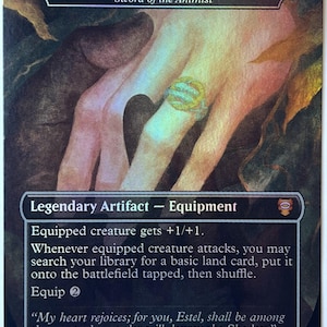 May include: A collectible trading card titled Ring of Barahir, featuring a gold ring with two intertwined serpents on a finger. The card text includes Legendary Artifact, Equipment, and flavor text by Arwen, with a holographic finish and dark art.