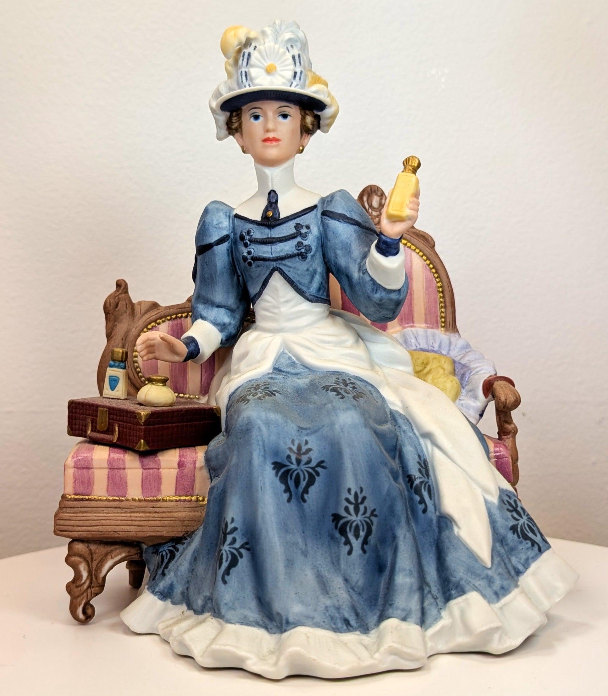 1992 Avon Mrs. Albee Award Porcelain Figurine - Sitting on Couch
