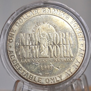 One Dollar Gaming Token, New York, Las Vegas, Nevada, 1997 - 1997, New York Hotel and Casino, Las Vegas, Nevada, 1 Gaming Token