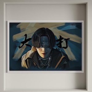 May include: A framed digital art print featuring a person with black hair wearing a brown jacket and a silver chain necklace. The person is wearing a blindfold and looking at the camera. The background is a blue and yellow abstract design with the word "火" in black calligraphy.