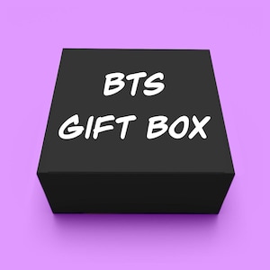 May include: Black gift box with white text that reads "BTS GIFT BOX".
