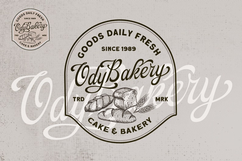 May include: Black and white logo for a bakery called "Ody Bakery." The logo features the bakery's name in a stylized script font, the words "Goods Daily Fresh" and "Cake & Bakery" in a sans-serif font, and a drawing of bread and wheat.