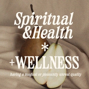 May include: Two pears, one whole and one cut in half, on a brown fabric background. The text "Spiritual & Health * WELLNESS having a magical or pleasantly unreal quality" is written in white on the fabric.