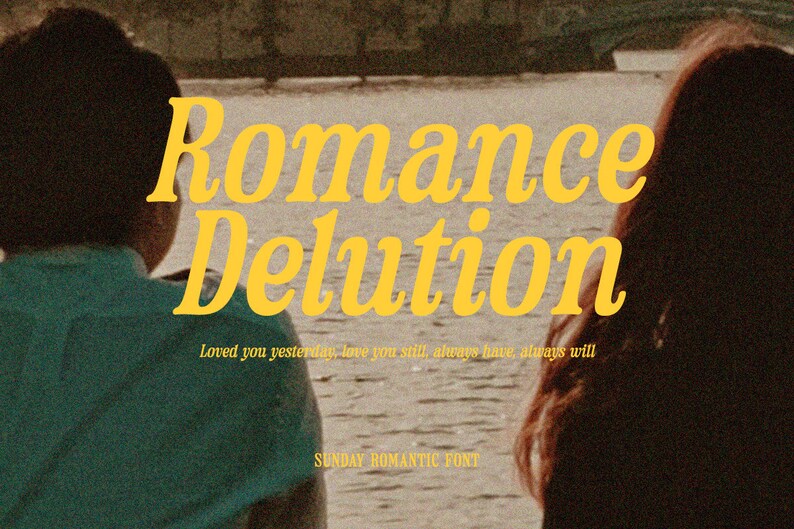 May include: A vintage-style graphic design featuring the text "Romance Delution" in yellow cursive font. The text is set against a blurred background of a couple standing by a body of water. The caption below the text reads "Loved you yesterday, love you still, always have, always will." The text "SUNDAY ROMANTIC FONT" appears at the bottom of the design.