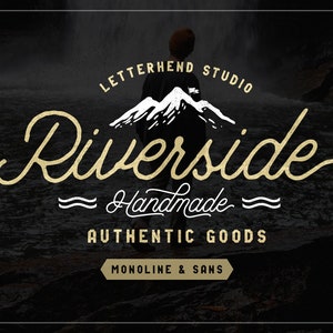 May include: A gold logo featuring the text "Riverside" in a cursive font. The logo also includes the text "Letterhead Studio", "Handmade", "Authentic Goods", and "Monoline & Sans". The logo is set against a dark background with a waterfall and a mountain range.