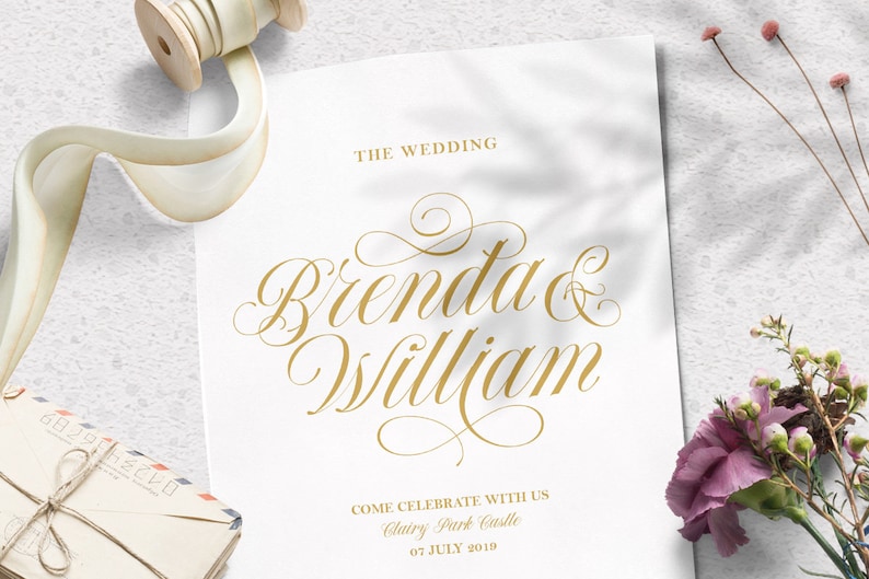 May include: A wedding invitation with gold lettering on a white background. The invitation reads "The Wedding Brenda & William Come Celebrate With Us Clairy Park Castle 07 July 2019".