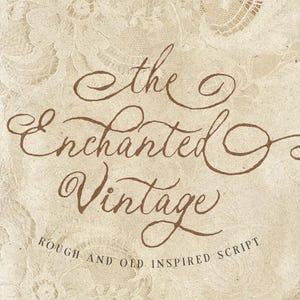 May include: A cream-colored fabric background with a delicate lace pattern featuring the brown cursive text the Enchanted Vintage and the smaller capitalized text ROUGH AND OLD INSPIRED SCRIPT centered on the surface.