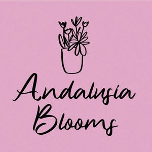 May include: A pink background with a black line drawing of a potted plant with flowers and the text "Andalusia Blooms" in a cursive font.
