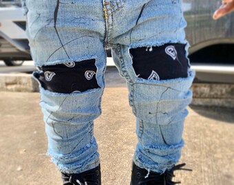 kids cut up jeans