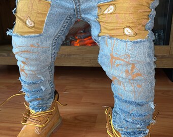 kids cut up jeans