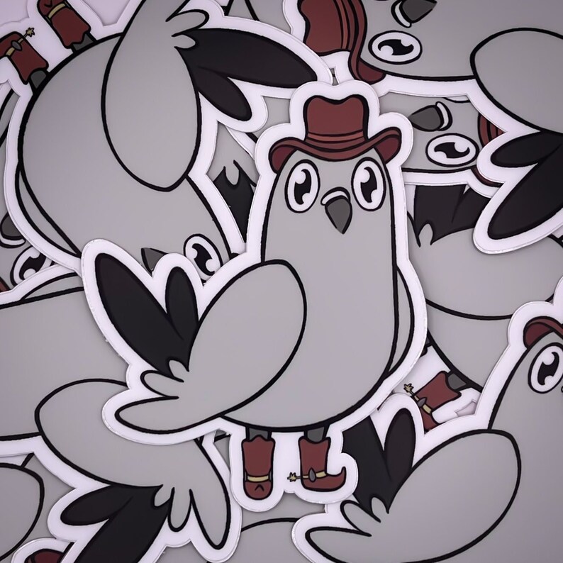 Op de afbeelding: Een set grijze en witte cartoon-vogel stickers met rode cowboyhoeden en laarzen. De vogels dragen cowboyhoeden en laarzen en hebben grote ogen. De stickers zijn perfect om een vleugje whimsy toe te voegen aan elk project.