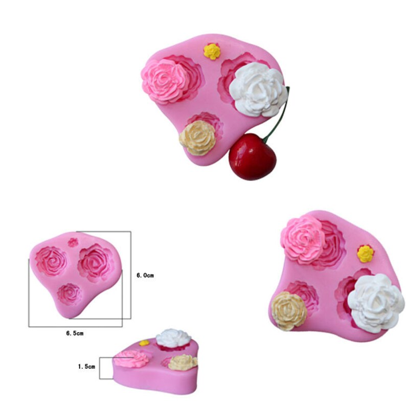 May include: Pink silicone moulds with rose and flower designs. The moulds feature various sizes of roses and other floral elements. A red cherry is next to the mould. The dimensions of the mould are 6.5 cm x 6.0 cm x 1.5 cm.