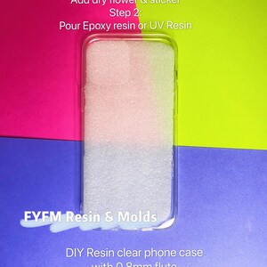 May include: A clear phone case with a white foam insert. The case is on a blue surface and the text "FYFM Resin & Molds" is visible. The text "DIY Resin clear phone case with 0.8mm flute" is also visible.